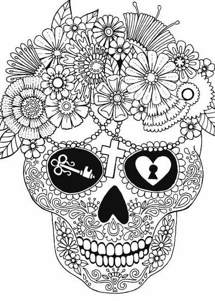 Calavera decorada con flores y símbolos.