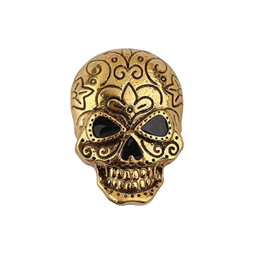 Calavera dorada decorada con patrones florales